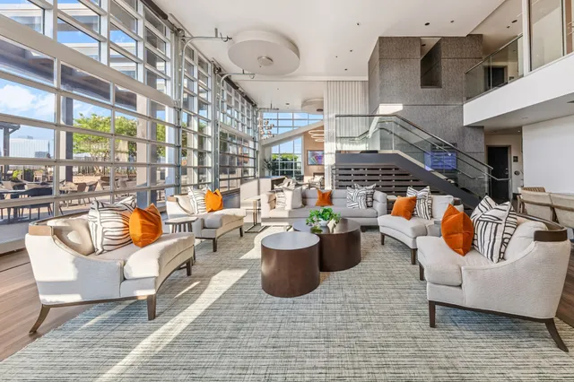 a kitchen with lots of counter top space and wooden floor