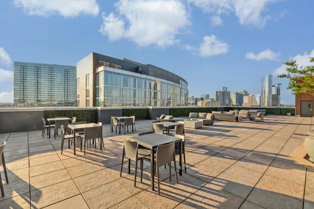 a view of a chairs and table in the patio