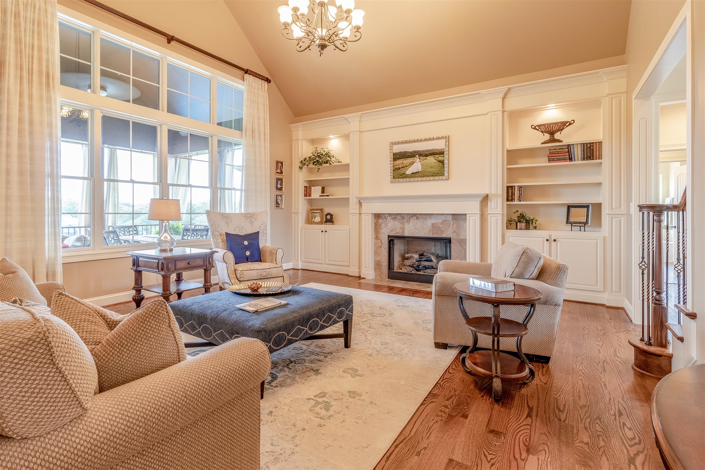 2687 Gunn Road Adams, TN 37010 - Photo 2 of 30 a living room with furniture a fireplace and a large window