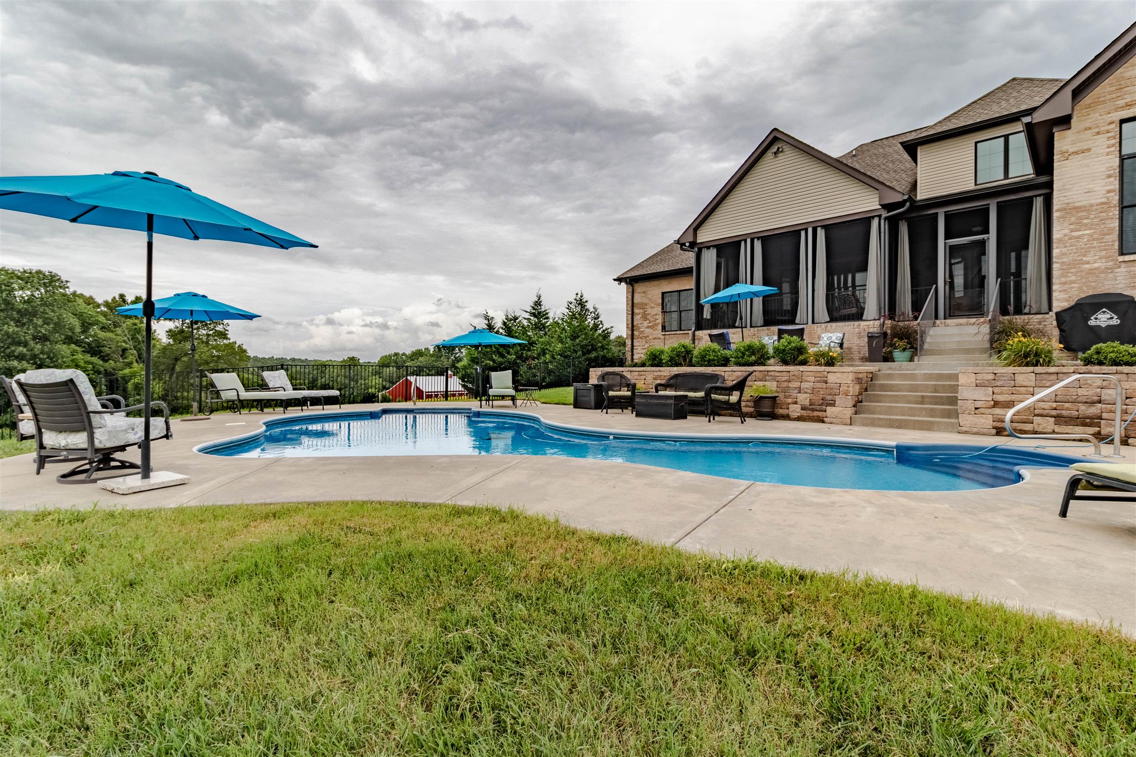 2687 Gunn Road Adams, TN 37010 - Photo 25 of 30 a view of pool with outdoor seating