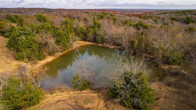 a view of a lake with mountains in the background
