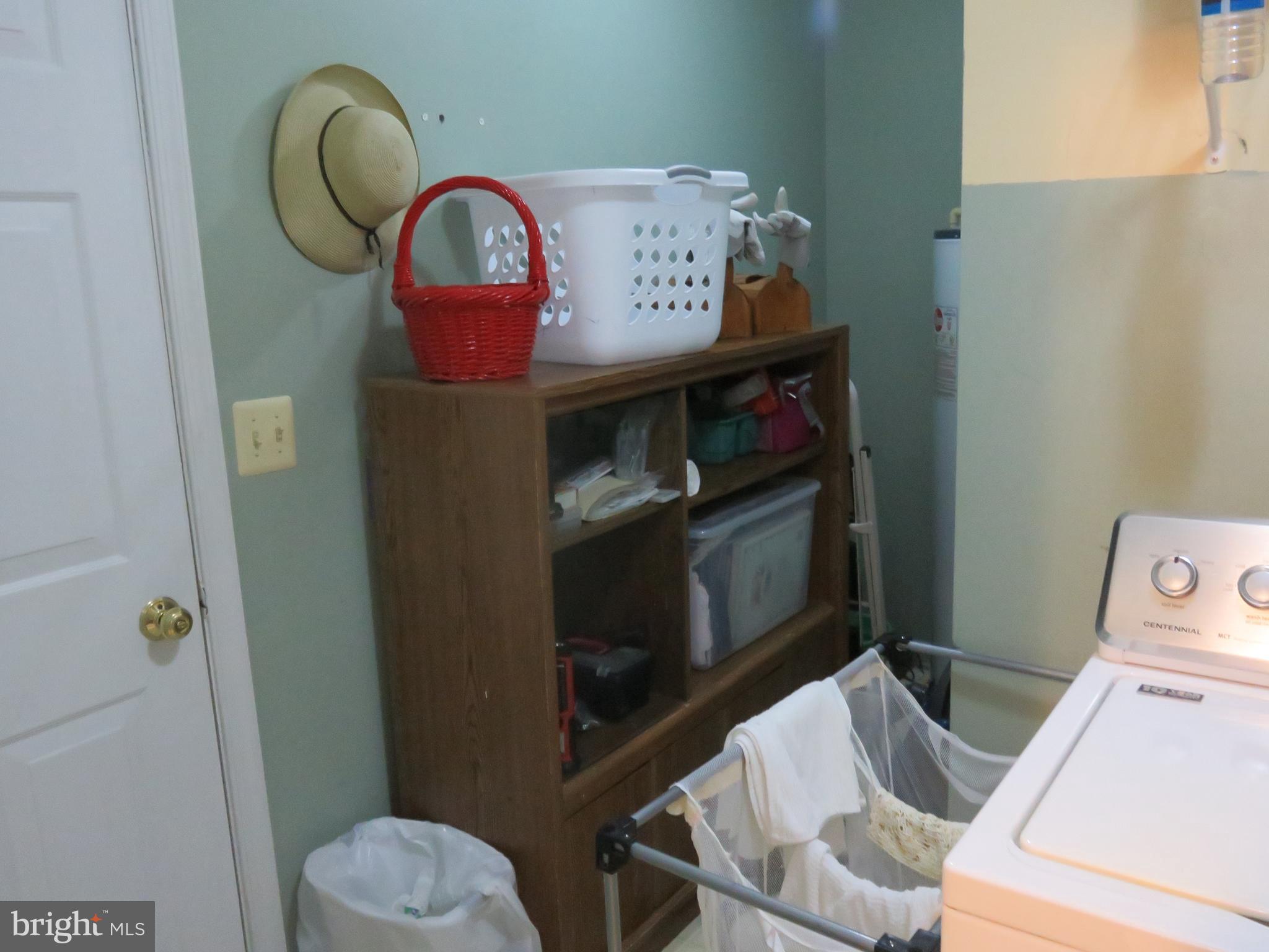 6907 Quail Run Hurlock, MD 21643 - Photo 14 of 30 Laundry room with storage