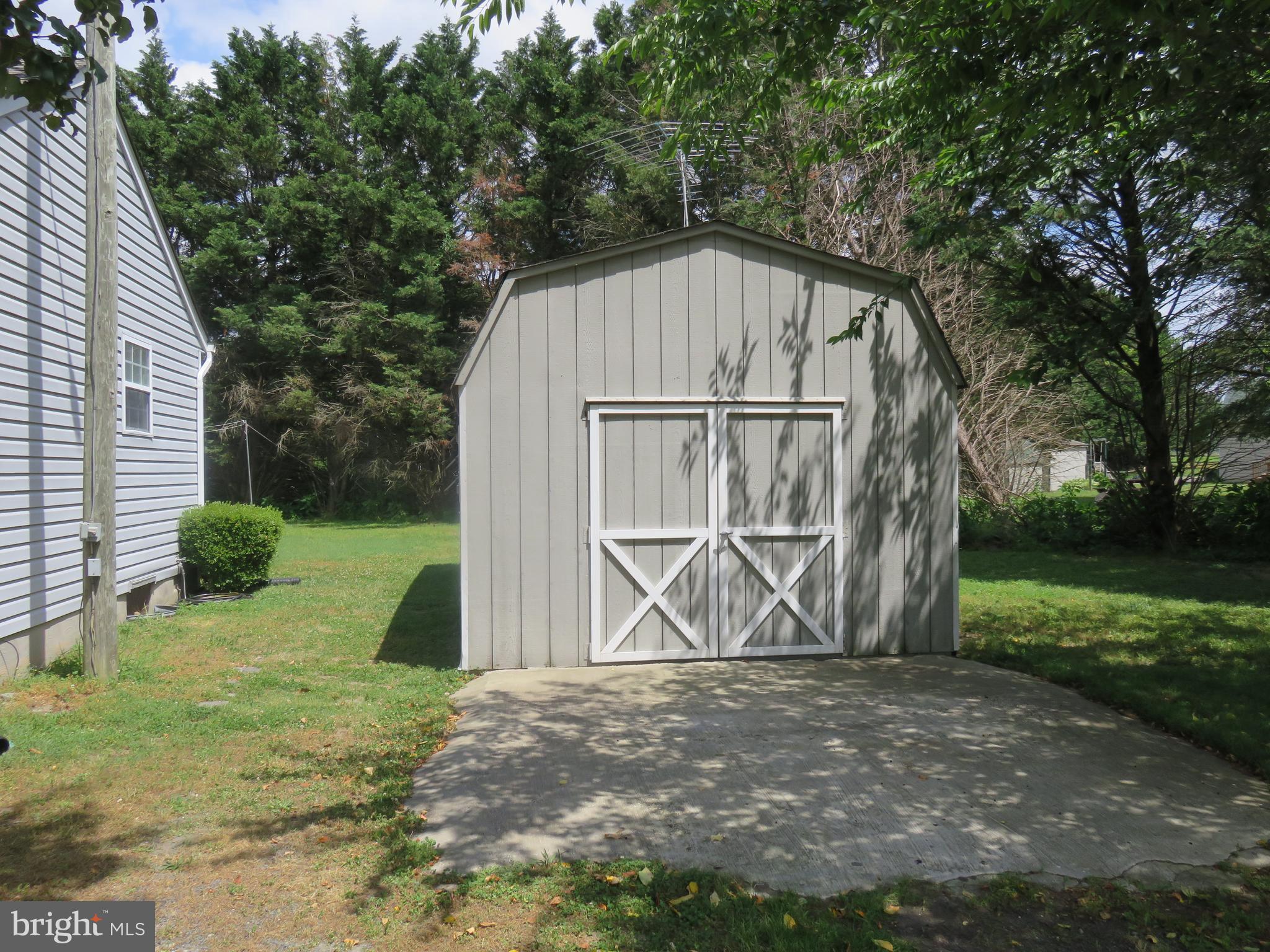 6907 Quail Run Hurlock, MD 21643 - Photo 24 of 30 12 x 24 shed with workbench and two entrances