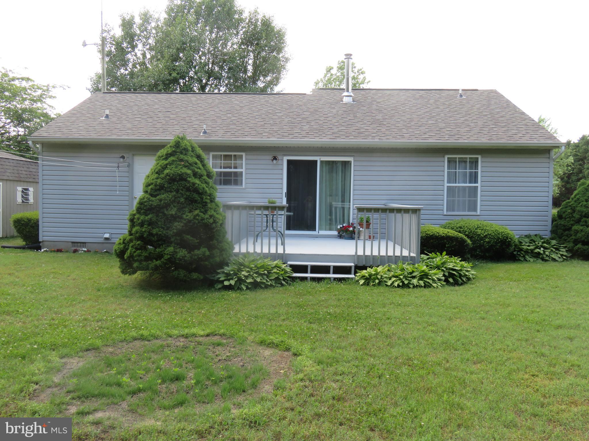 6907 Quail Run Hurlock, MD 21643 - Photo 26 of 30 Back of house with 12 x 12 deck