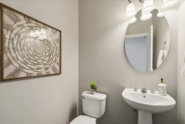 a bathroom with a sink and mirror