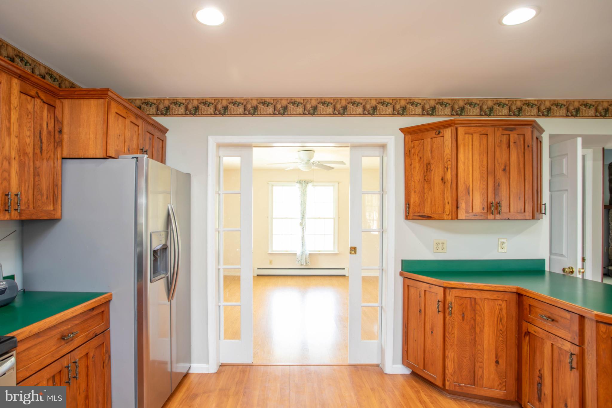 161 Coyote Run Mathias, WV 26812 - Photo 23 of 88 Inviting kitchen with warm wood accents.