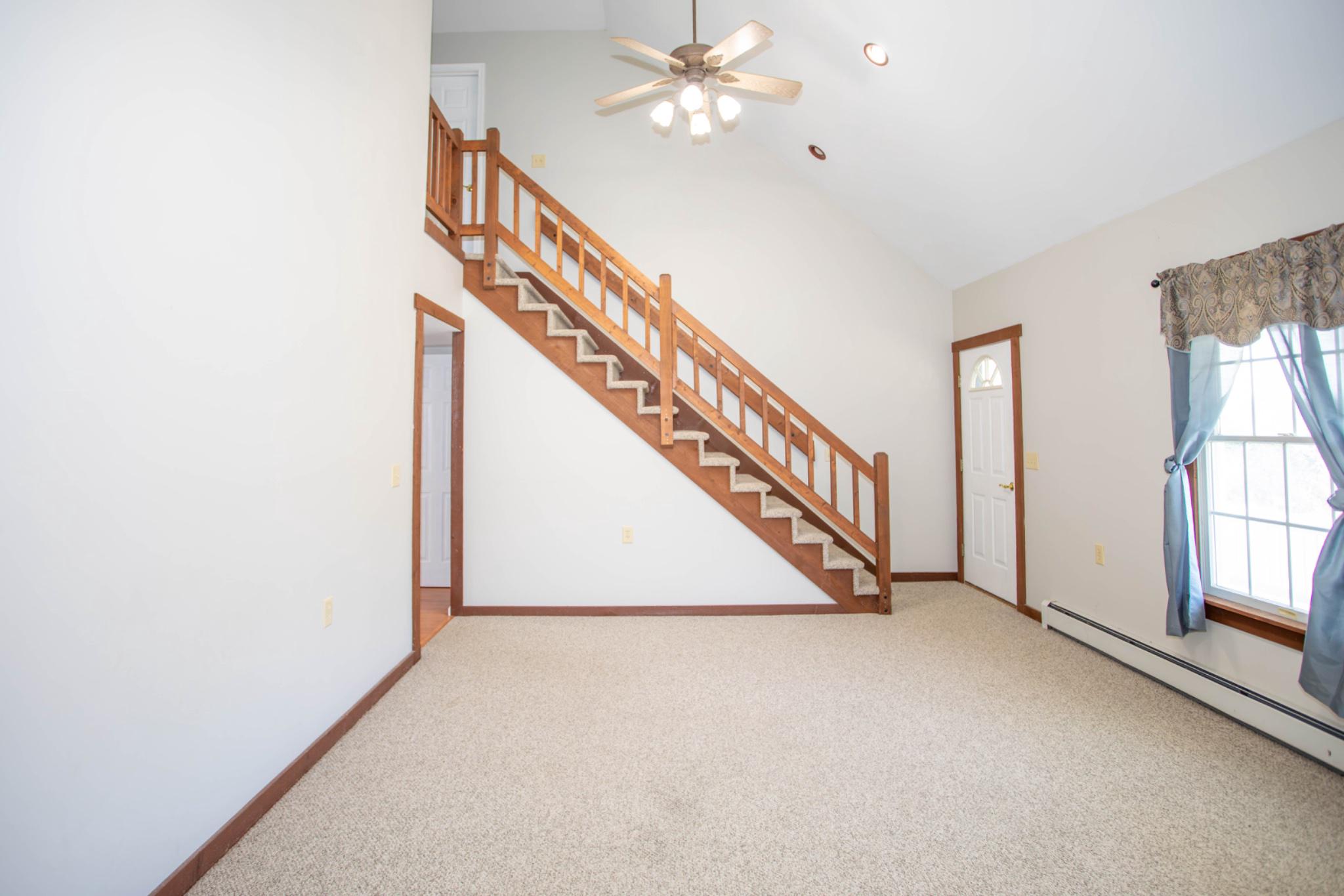 161 Coyote Run Mathias, WV 26812 - Photo 30 of 88 Staircase to upper level