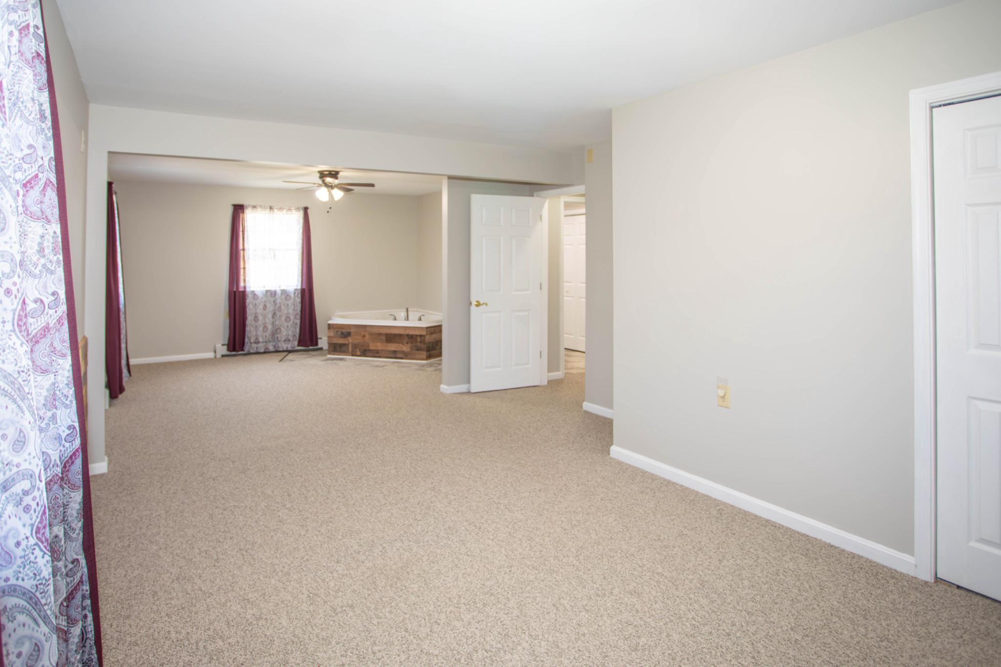 161 Coyote Run Mathias, WV 26812 - Photo 31 of 88 Primary entry level bedroom.