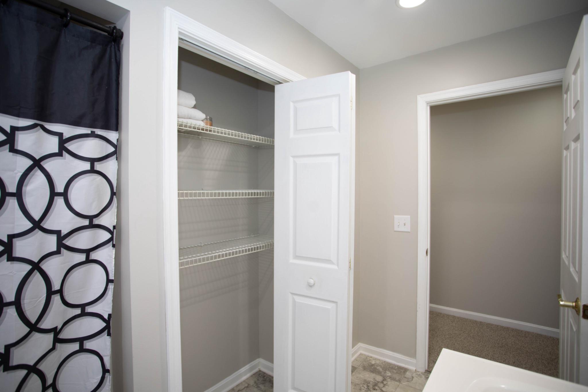 161 Coyote Run Mathias, WV 26812 - Photo 43 of 88 Modern entry level bathroom with ample storage.