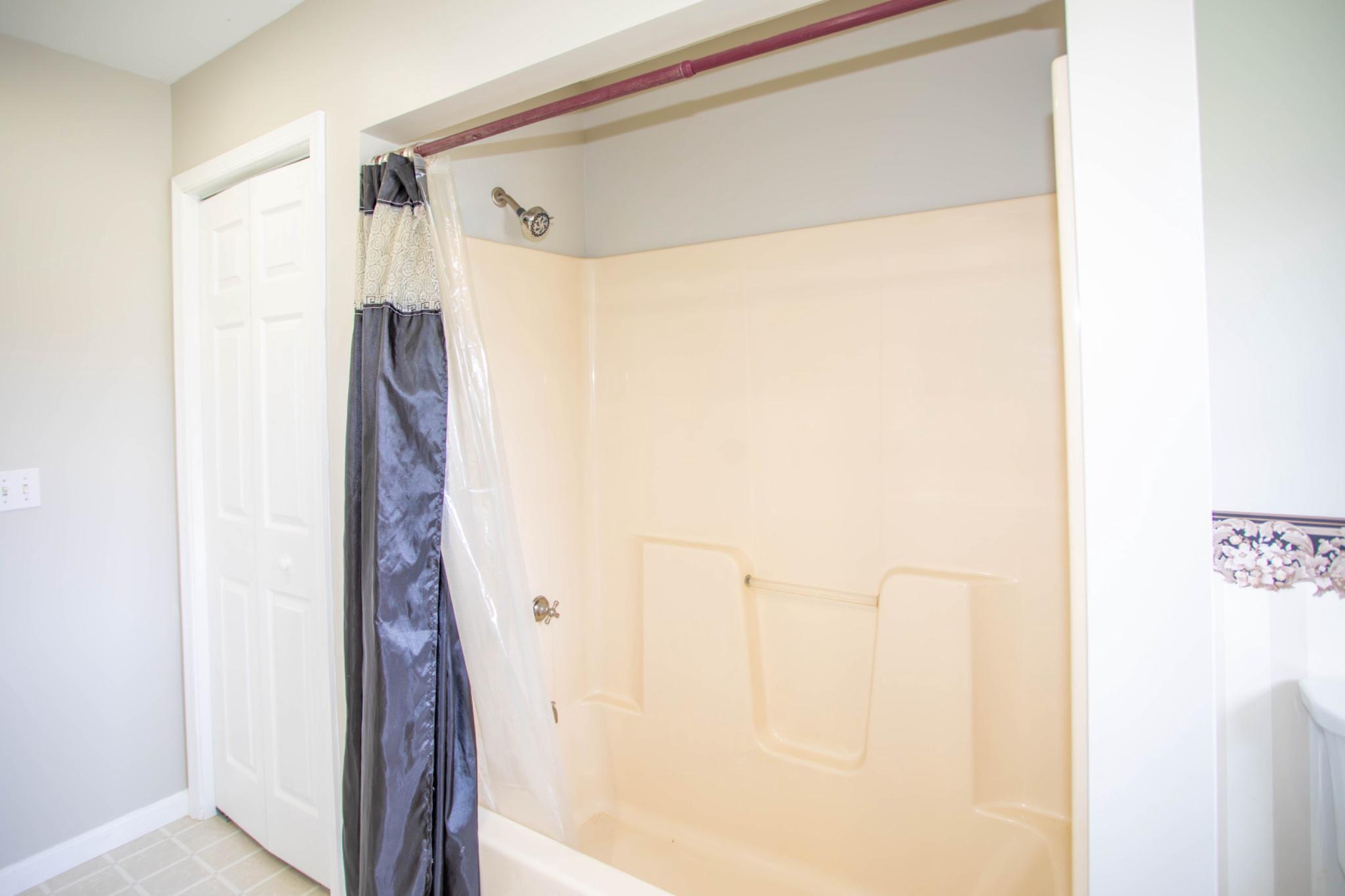 161 Coyote Run Mathias, WV 26812 - Photo 60 of 88 Upper level hall bath with linen closet.