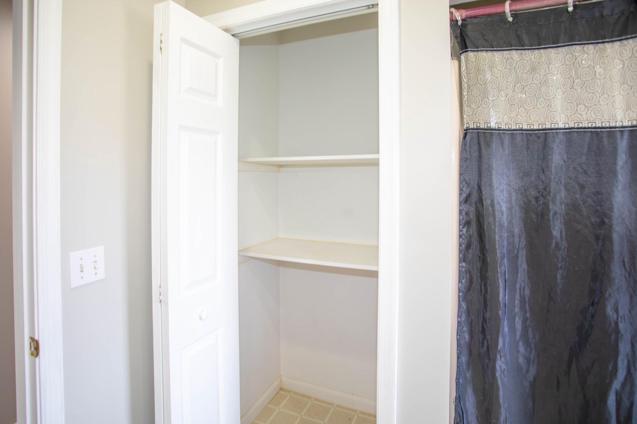 161 Coyote Run Mathias, WV 26812 - Photo 62 of 88 Upper level hall bath linen closet.