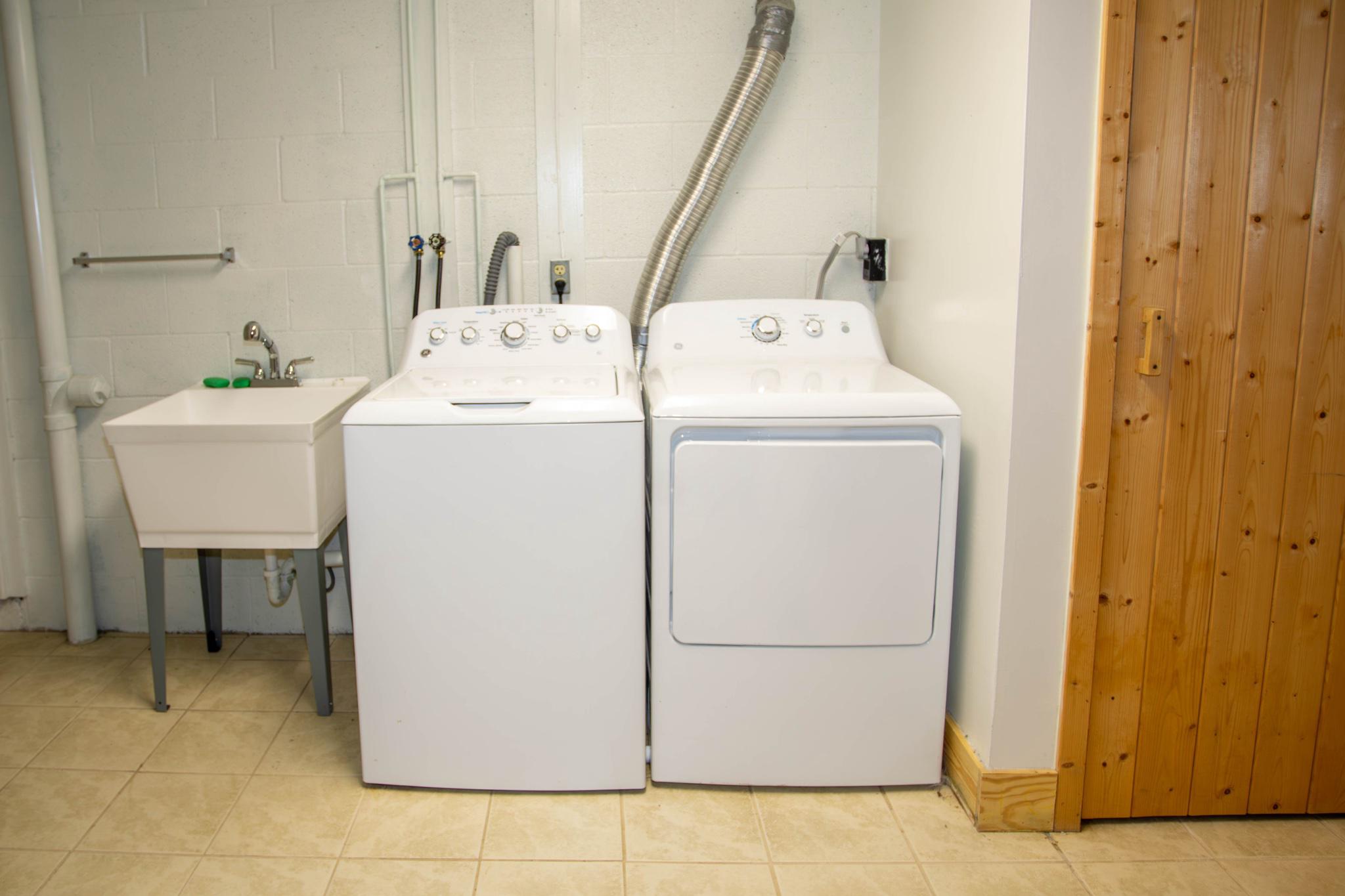 161 Coyote Run Mathias, WV 26812 - Photo 73 of 88 Lower level laundry space with utility sink.
