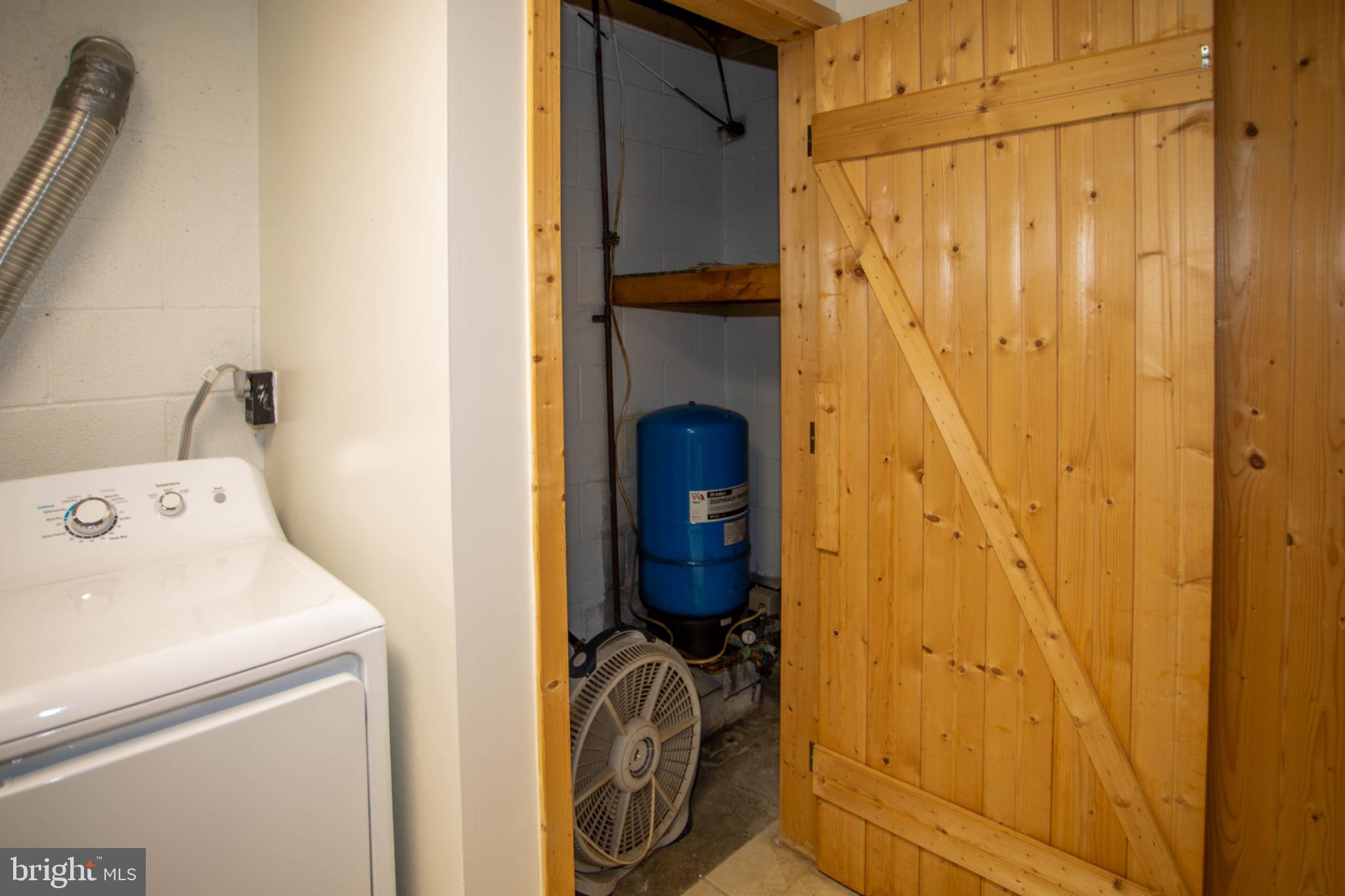 161 Coyote Run Mathias, WV 26812 - Photo 77 of 88 Charming utility space with rustic flair.