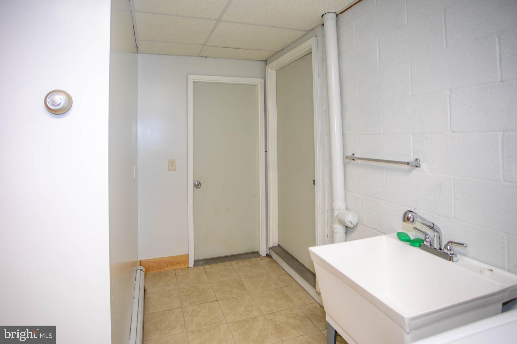 161 Coyote Run Mathias, WV 26812 - Photo 78 of 88 Spacious utility area with potential.