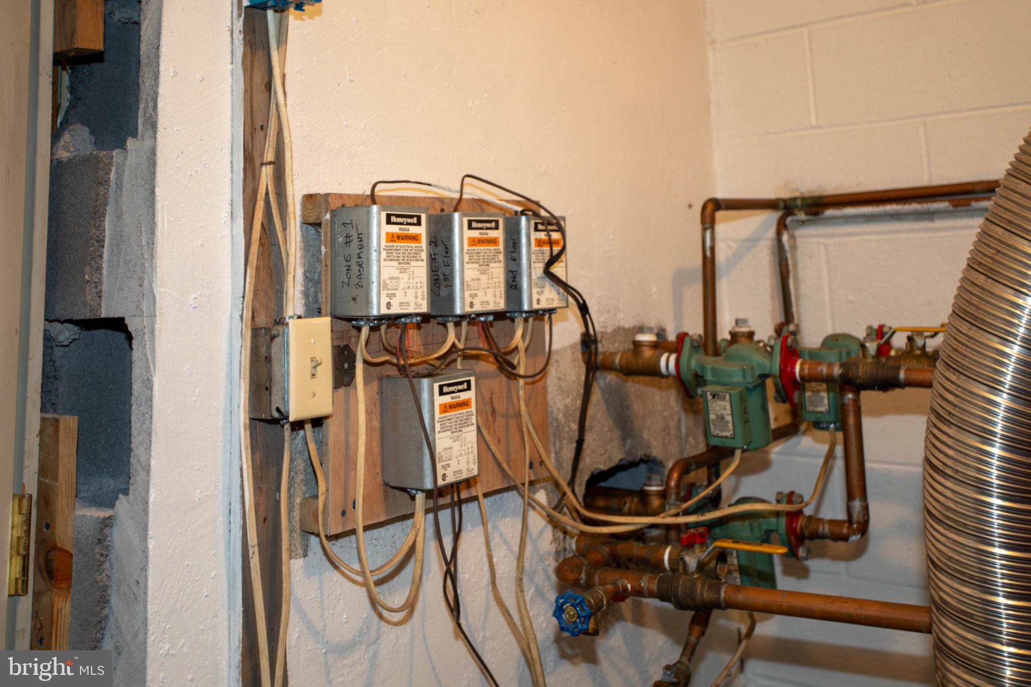 161 Coyote Run Mathias, WV 26812 - Photo 79 of 88 Utility connections in a basement setting.