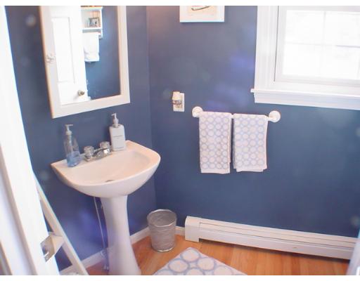 1 Stoneybrook Road Grafton, MA 01536 - Photo 12 of 30 a bathroom with a sink a mirror and a toilet