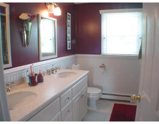 1 Stoneybrook Road Grafton, MA 01536 - Photo 15 of 30 a bathroom with a granite countertop sink a toilet and a mirror