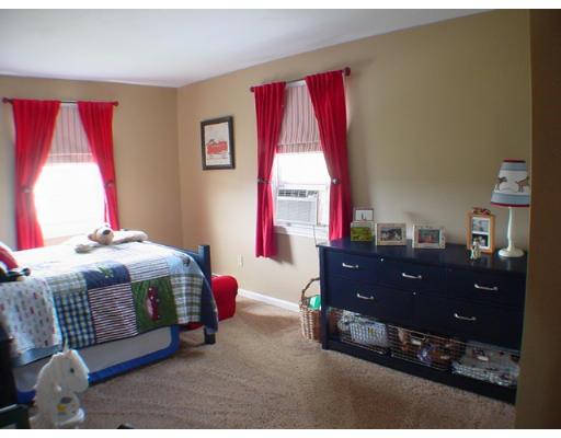 1 Stoneybrook Road Grafton, MA 01536 - Photo 18 of 30 a bedroom with a bed and window