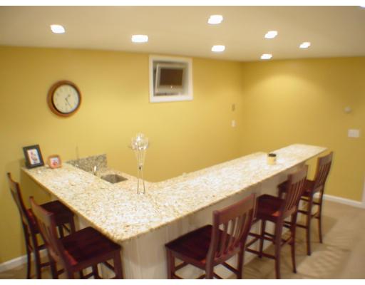 1 Stoneybrook Road Grafton, MA 01536 - Photo 23 of 30 a kitchen with a table and chairs in it