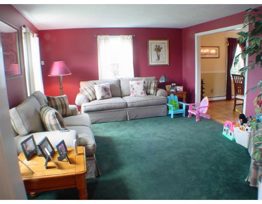 1 Stoneybrook Road Grafton, MA 01536 - Photo 8 of 30 a living room with furniture and a fireplace