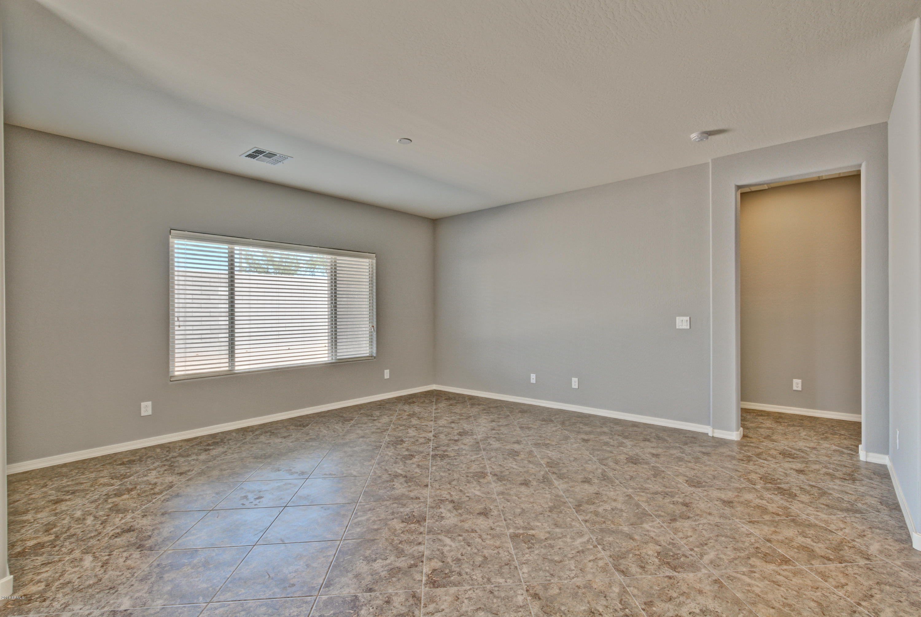 16746 West Rowel Road Surprise, AZ 85387 - Photo 22 of 35 Family Room - Lot 4 The Palms
