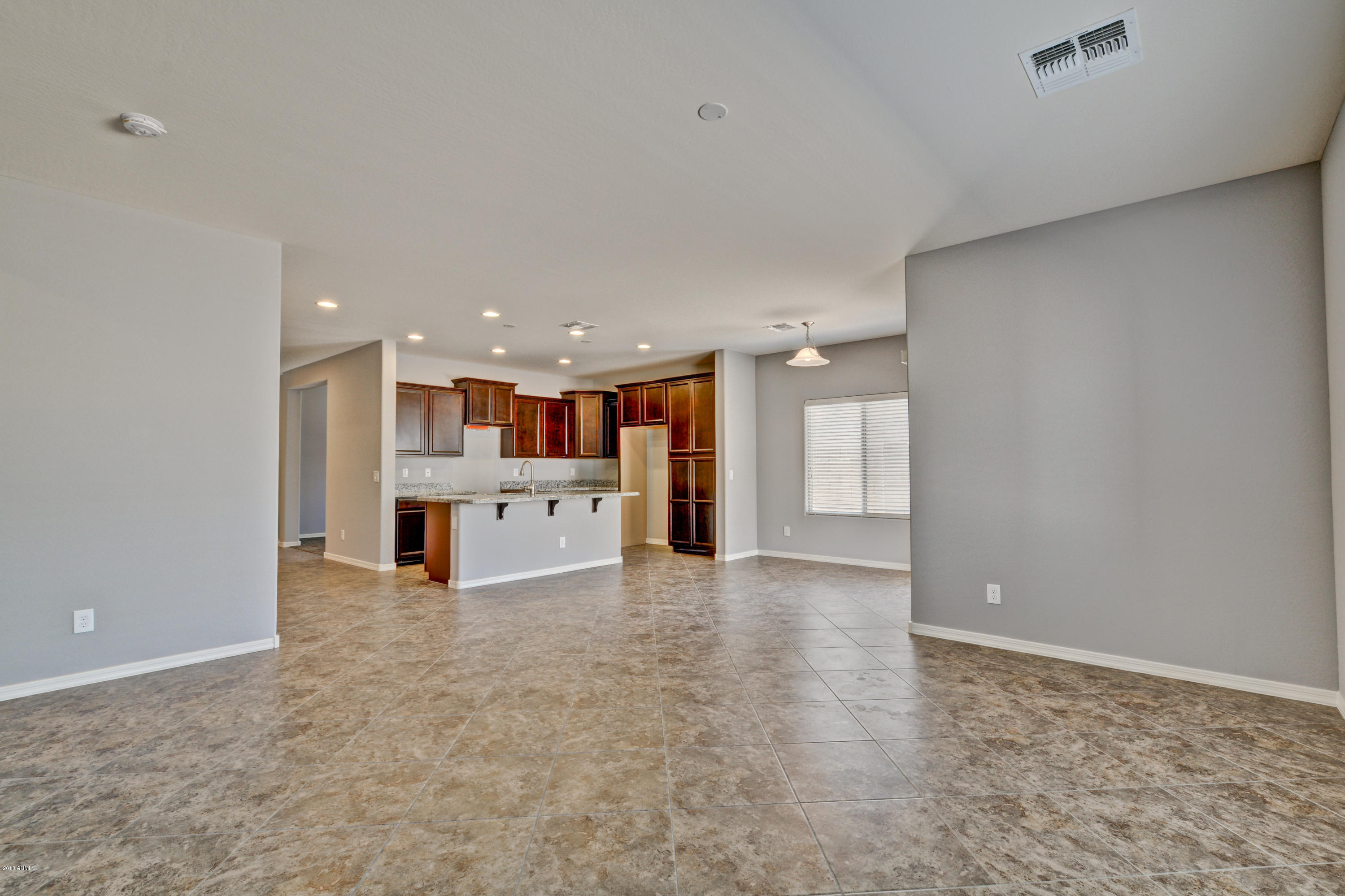 16746 West Rowel Road Surprise, AZ 85387 - Photo 23 of 35 Family Room/Great Room - Lot 4 The Palms