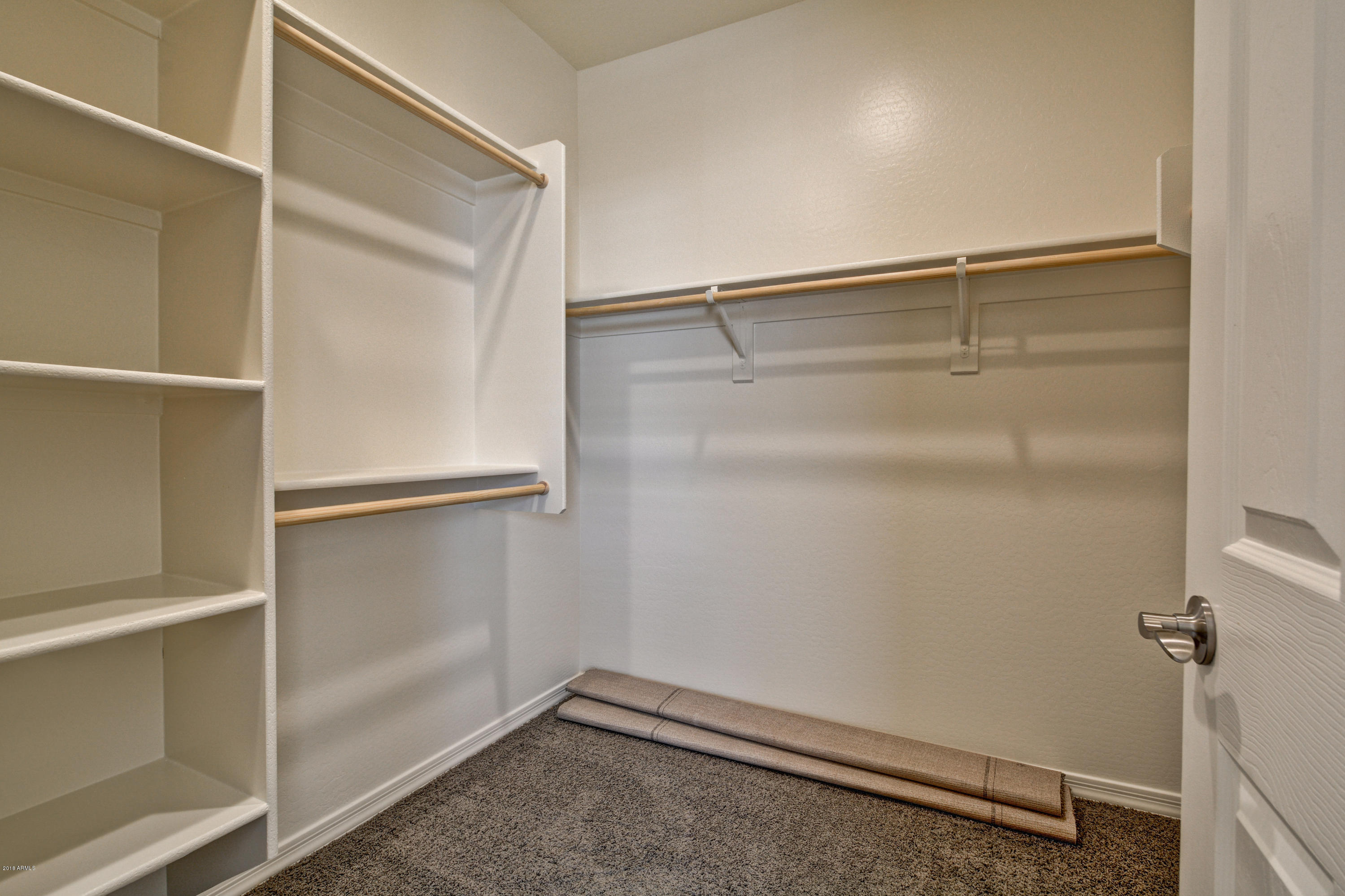 16746 West Rowel Road Surprise, AZ 85387 - Photo 30 of 35 a view of an empty walk in closet