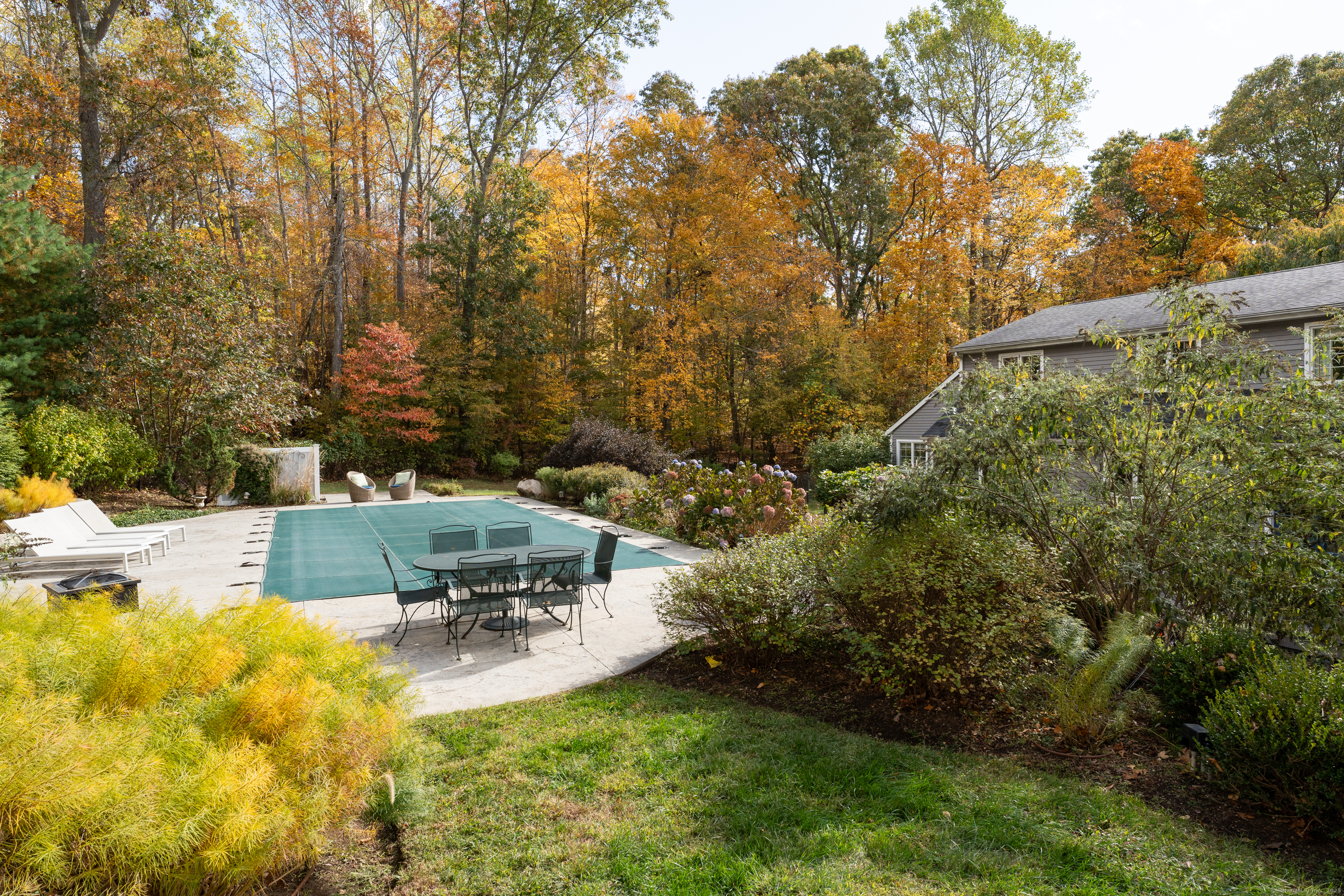 214 Nortontown Road Guilford, CT 06437 - Photo 35 of 40 a view of a swimming pool with a yard