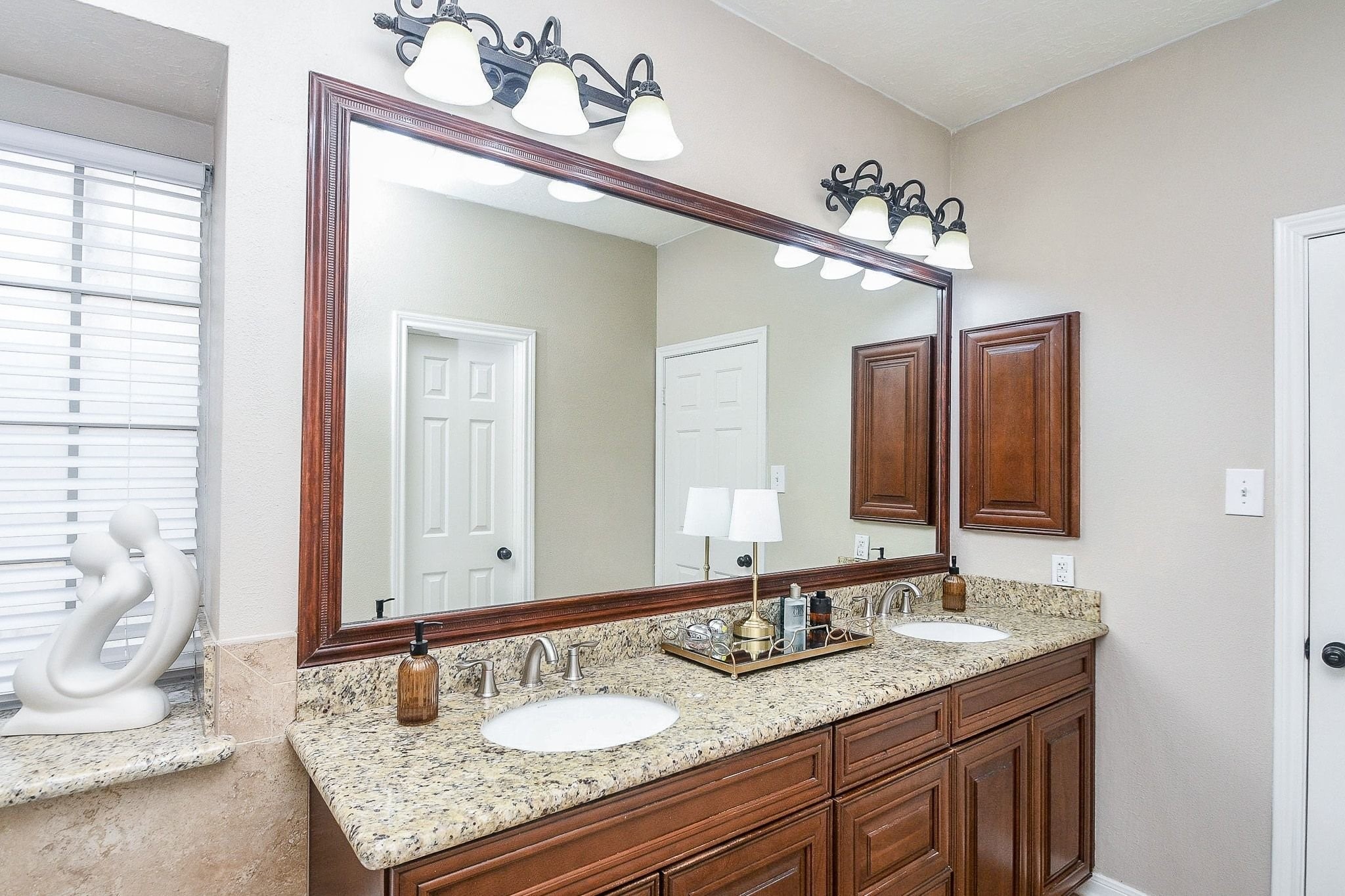 3106 Dulaney Road Houston, TX 77084 - Photo 16 of 33 Primary bathroom with double sinks.