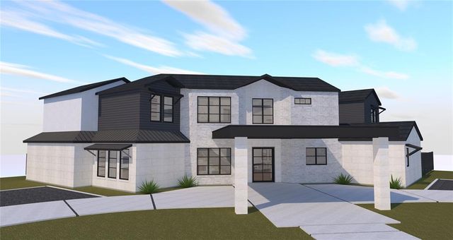 a front view of a house with a garden and garage