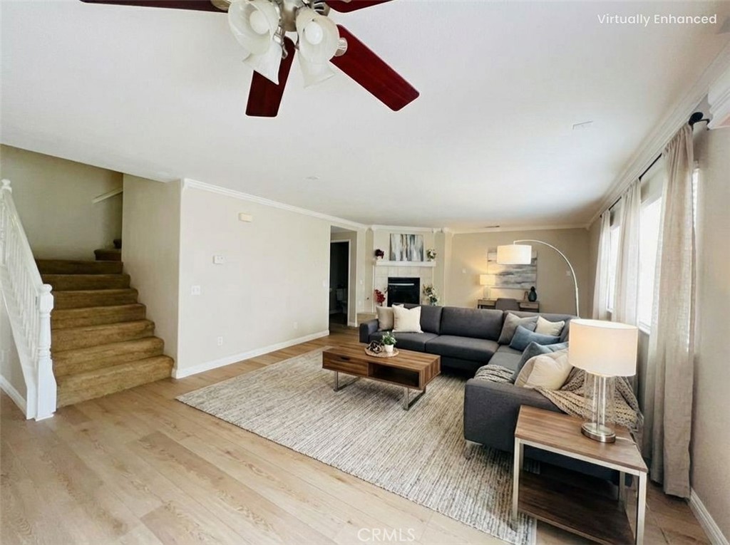 12270 Mesa Grove Drive Riverside, CA 92503 - Photo 15 of 41 a living room with furniture and wooden floor