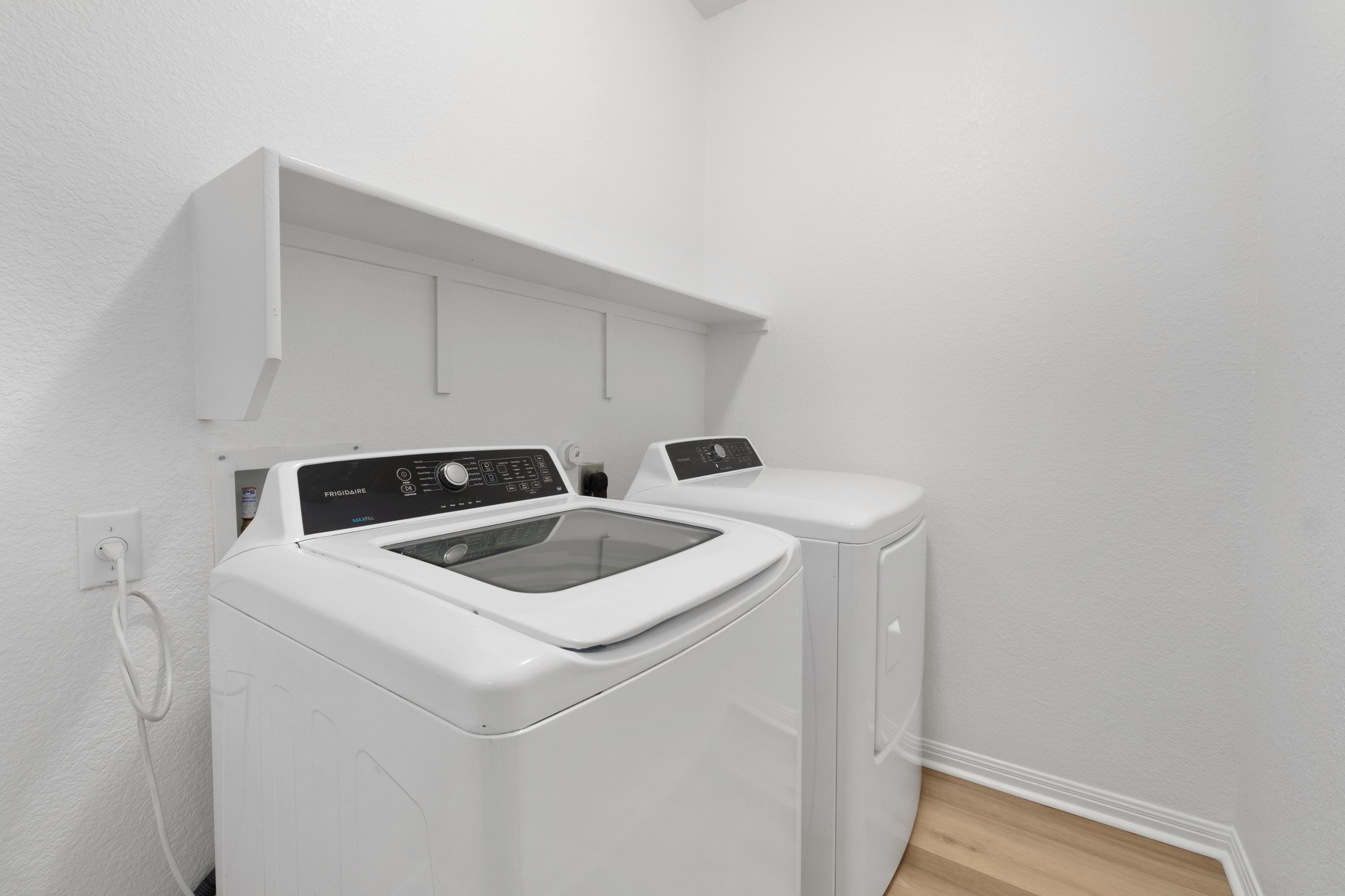15905 Windroot Street Austin, TX 78728 - Photo 26 of 30 Laundry downstairs