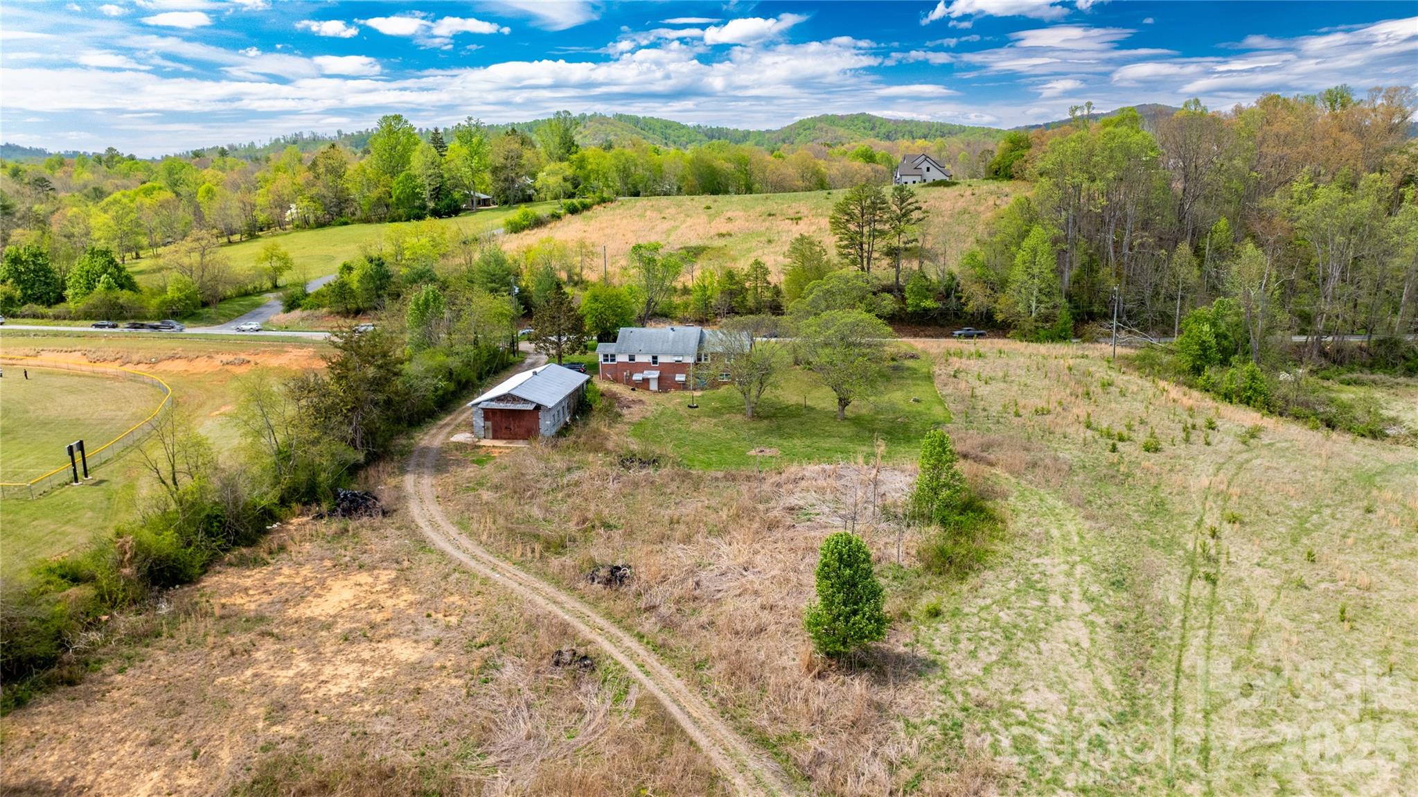 1720 Cane Creek Road Fletcher, NC 28732 - Photo 19 of 20 a view of a pathway with a yard