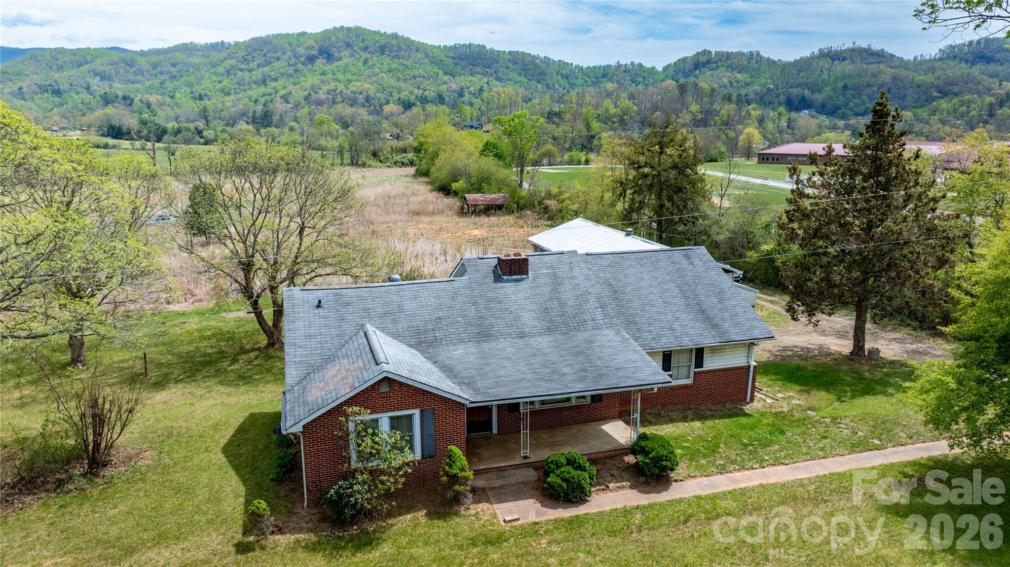 1720 Cane Creek Road Fletcher, NC 28732 - Photo 4 of 20 an aerial view of a house with a yard