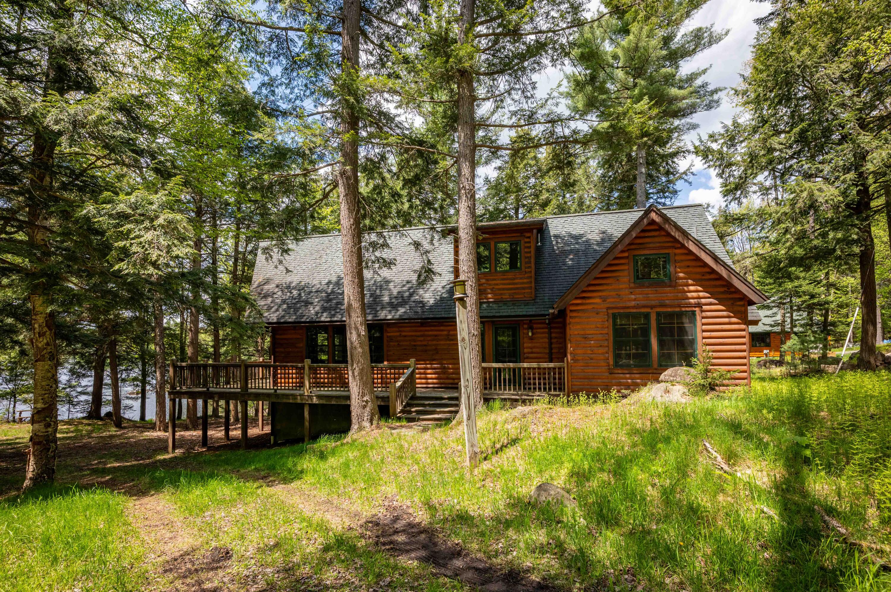 2525 North Point Road Raquette Lake, NY 13436 - Photo 6 of 48 Right side of Cabin