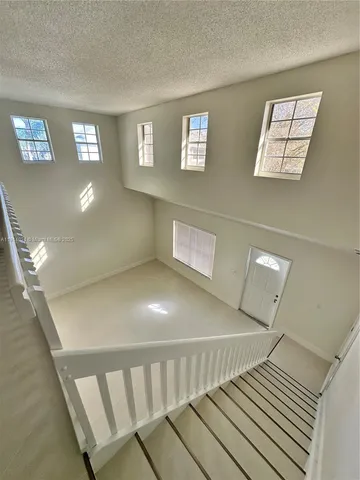 a bathroom with a shower and a toilet