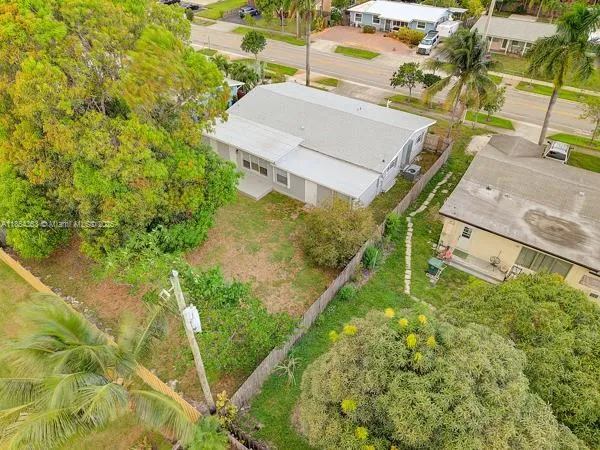 view of a house with a yard