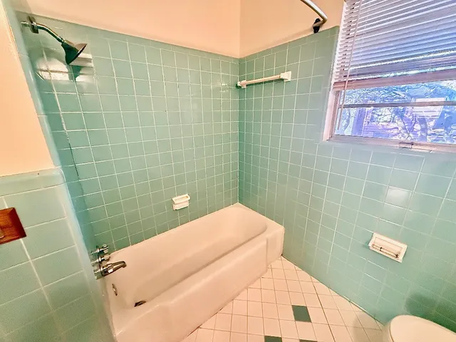 a bathroom with a bathtub