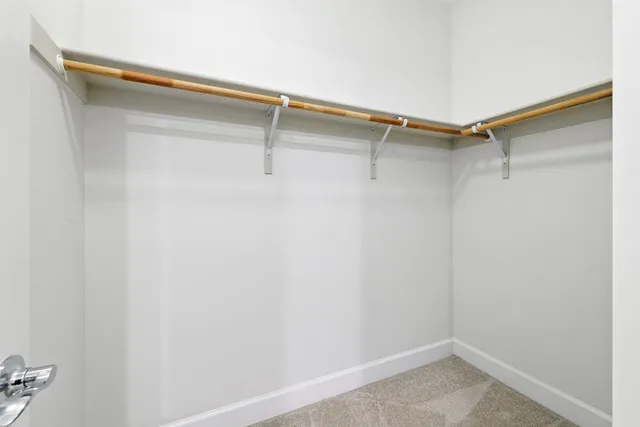 a view of a room with racks on the wall