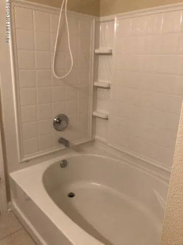 a bathroom with a bathtub