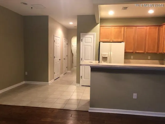 a view of a kitchen with a window