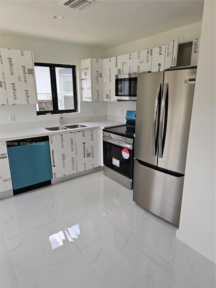 1749 Northwest 69th Street, Unit 1 Miami, FL 33147 - Photo 4 of 9