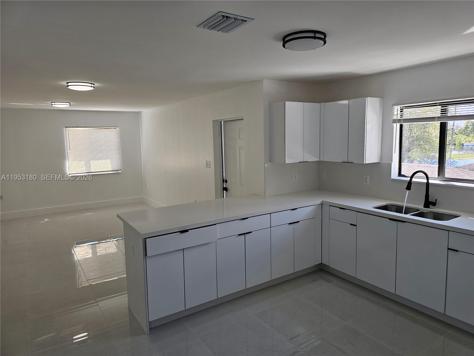 1749 Northwest 69th Street, Unit 1 Miami, FL 33147 - Photo 6 of 9