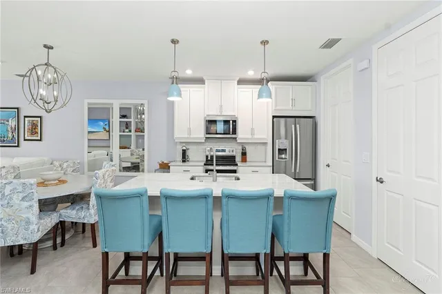 a bedroom with furniture and windows