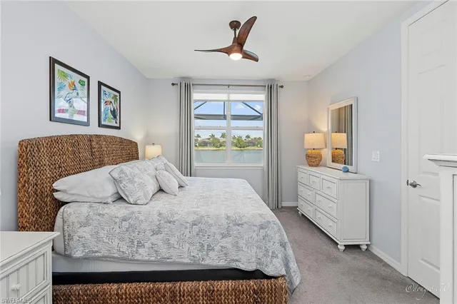 a bathroom with a double vanity sink a toilet and a mirror