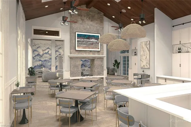 a view of a patio with a table and chairs under an umbrella