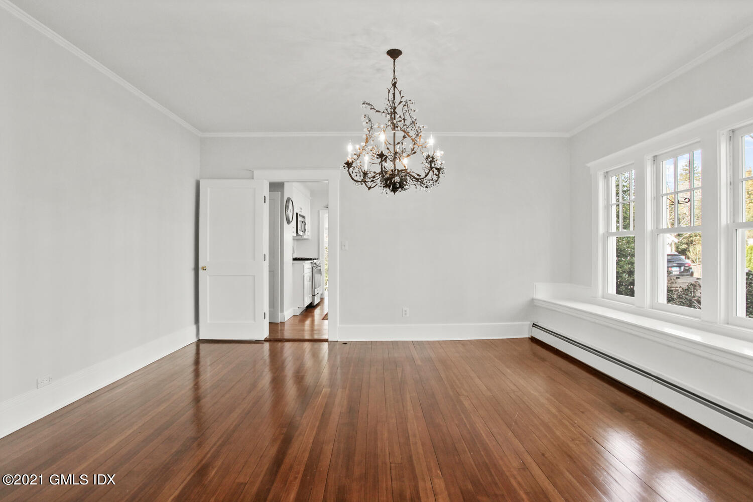 11 Chapel Lane Riverside, CT 06878 - Photo 12 of 33 a view of empty room with wooden floor and fan