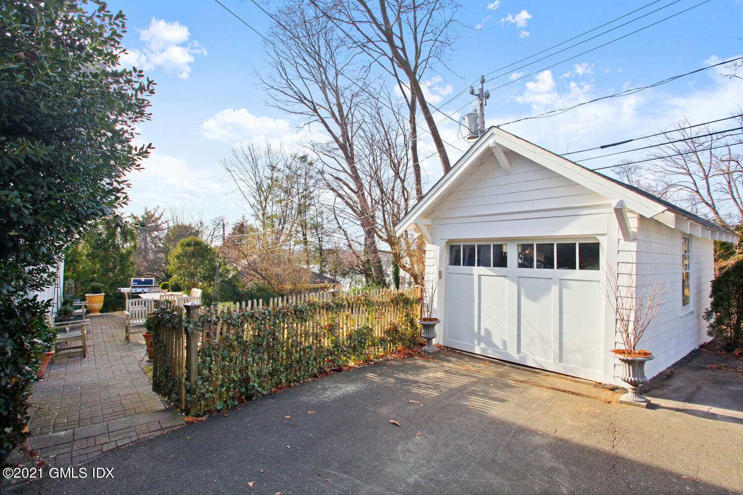11 Chapel Lane Riverside, CT 06878 - Photo 30 of 33 a front view of a house with a garage