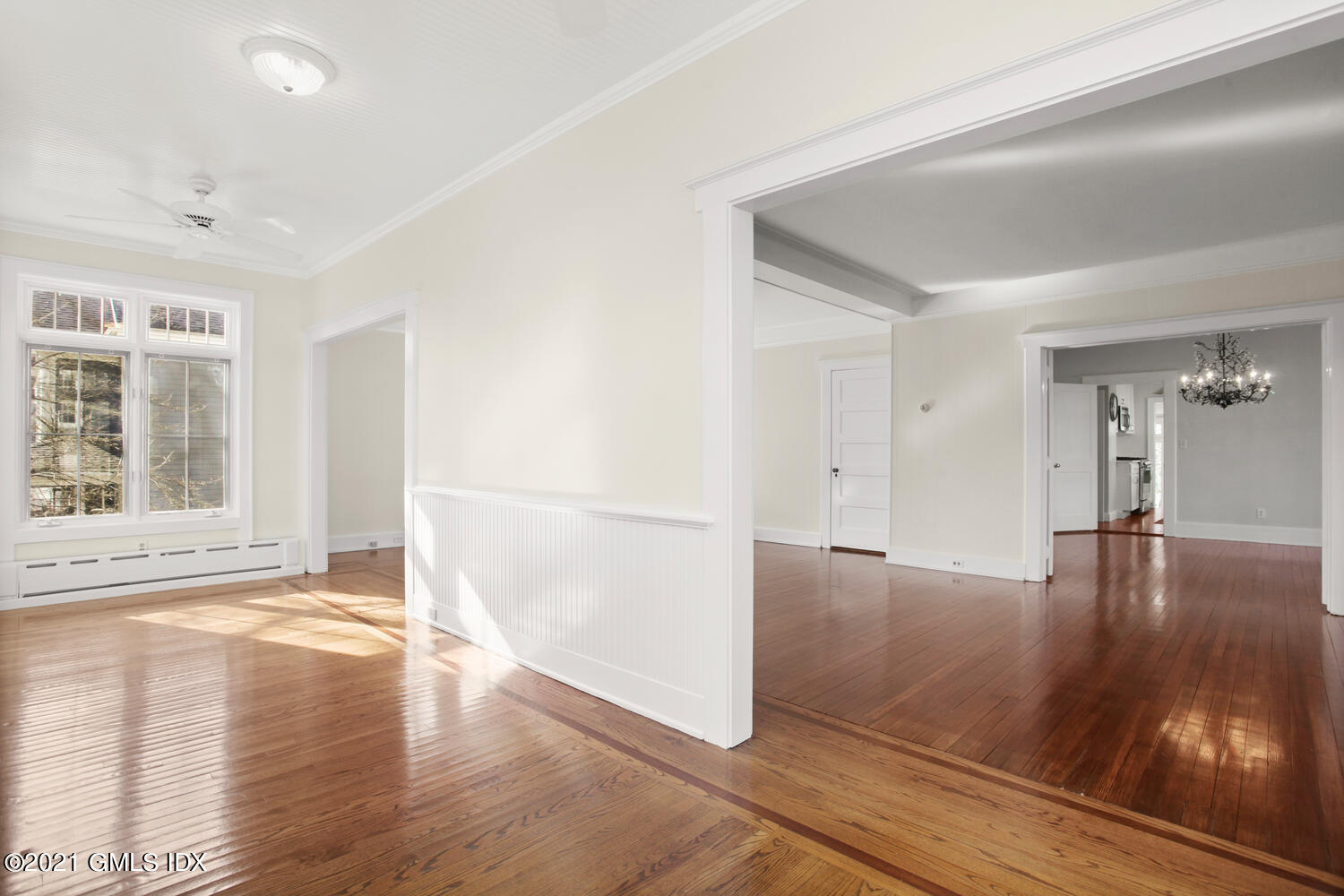 11 Chapel Lane Riverside, CT 06878 - Photo 5 of 33 a view of empty room with wooden floor and fan
