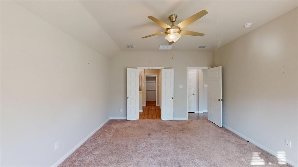 603 Cherry Hill Road Red Oak, TX 75154 - Photo 14 of 32 an empty room with closet and windows